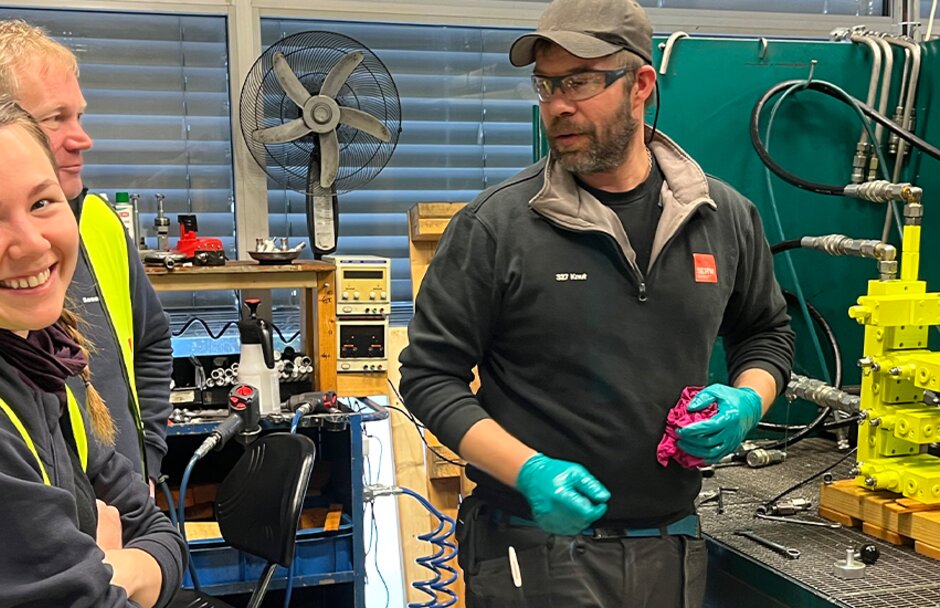 Ausra Konstantinaviciute, Project engineer and Gregor Bidmead at Seasystems at Servi in Kongsberg where Team leader Knut Odden at Servi completes the FAT on the hydraulic manifolds